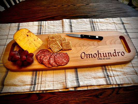 Customized/engraved (23in x 7 1/2in) cherry hardwood charcuterie board with handles